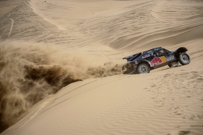 Ronan Chabot (driver) and Gilles Pillot (co-driver) race during the 10th stage of Dakar Rally from Iquique to Antofagasta, Chile on January 15th, 2014